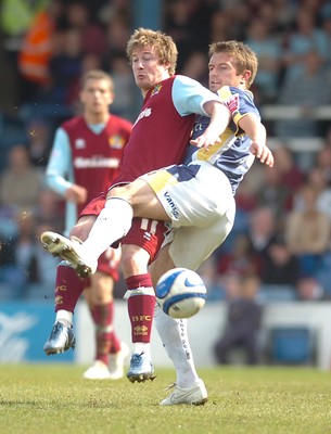 13.04.09 - Championship Football -  Cardiff City v Burnley -  Burnley's Wade Elliott and Cardiff's Stephen McPhail compete 