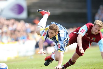 13.04.09.. Cardiff City v Burnley, Coca Cola Championship -  Cardiff's Ross McCormack is brought down by Burnley's Christian Kalvenes  
