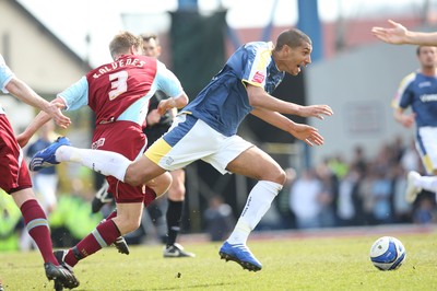 13.04.09.. Cardiff City v Burnley, Coca Cola Championship -  Cardiff's Jay Bothroyd is brought down by Burnley's Christian Kalvenes  