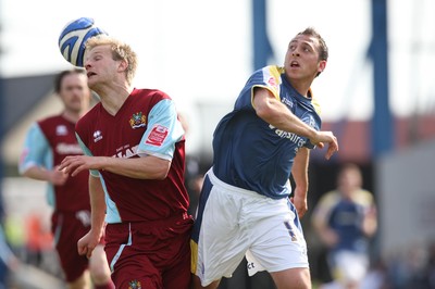 13.04.09.. Cardiff City v Burnley, Coca Cola Championship -  Burnley's Christian Kalvenes  and Cardiff's Michael Chopra compete for the ball 