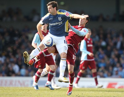 13.04.09.. Cardiff City v Burnley, Coca Cola Championship -  Cardiff's Joe Ledley and Burnley's Chris Eagles compete for the ball 