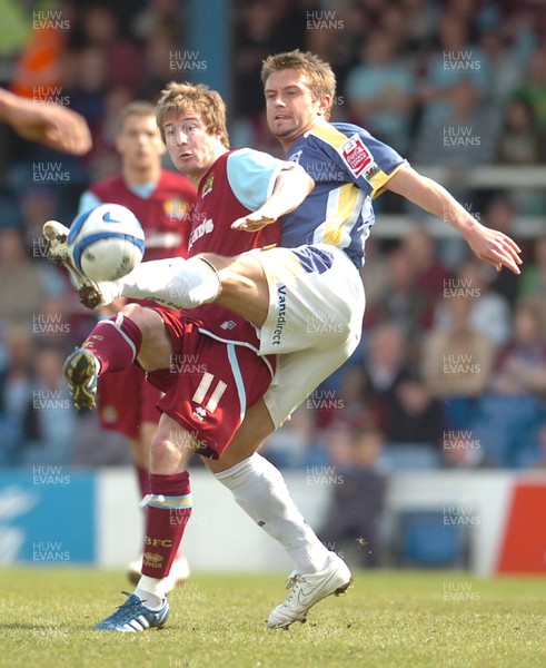 13.04.09 - Championship Football -  Cardiff City v Burnley -  Burnley's Wade Elliott and Cardiff's Stephen McPhail compete 