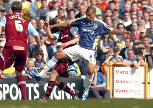 13.04.09 - Championship Football -  Cardiff City v Burnley -  Cardiff's Jay Bothroyd is tackled by Burnley's Christian Kalvenes 