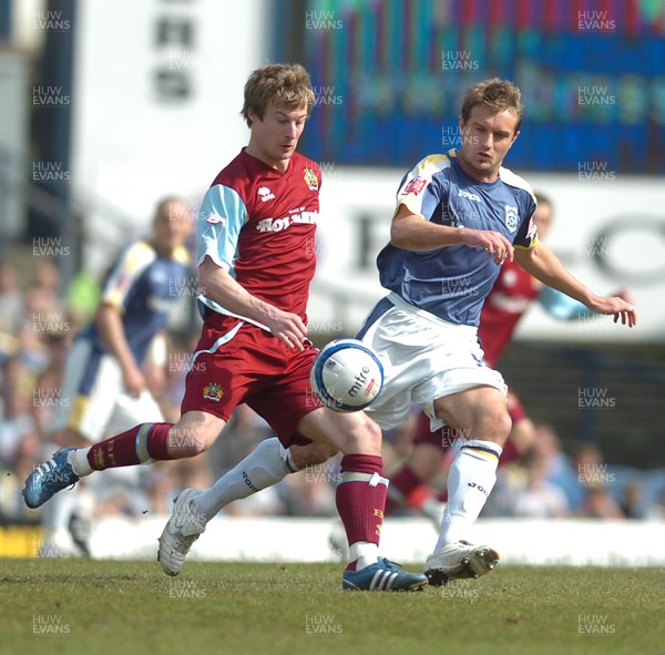 13.04.09 - Championship Football -  Cardiff City v Burnley -  Burnley's Wade Elliott is challenged by  Cardiff's Stephen McPhail  