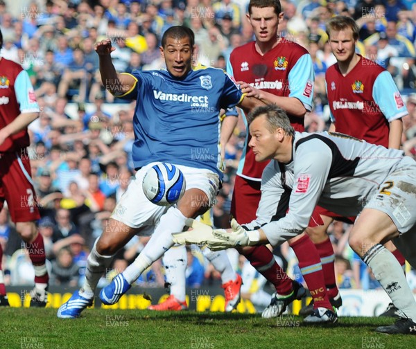 13.04.09 - Championship Football -  Cardiff City v Burnley -  Cardiff's Jay Bothroyd and Burnley 'keeper Brian Jensen go for the ball 
