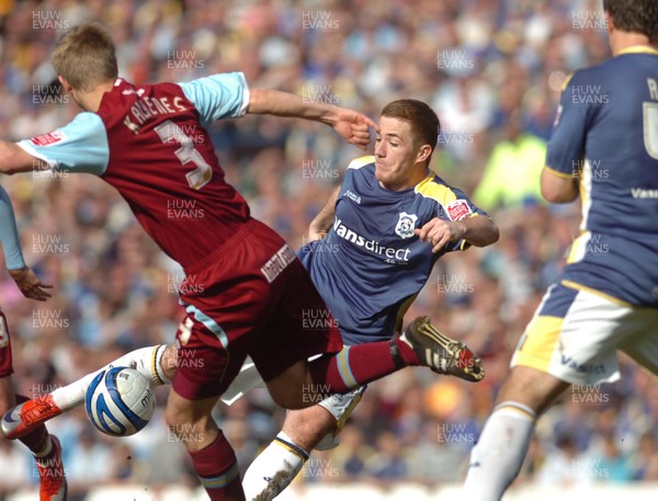 13.04.09 - Championship Football -  Cardiff City v Burnley -  Cardiff's Ross McCormack takes a shot as Burnley's Christian Kalvenes challenges 