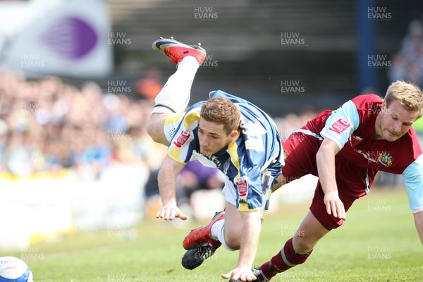 13.04.09.. Cardiff City v Burnley, Coca Cola Championship -  Cardiff's Ross McCormack is brought down by Burnley's Christian Kalvenes  