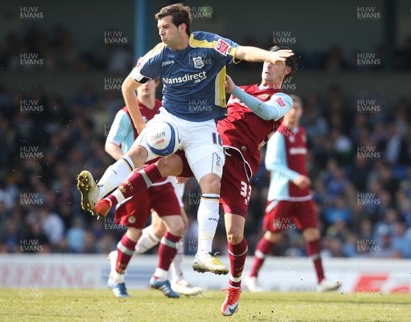 13.04.09.. Cardiff City v Burnley, Coca Cola Championship -  Cardiff's Joe Ledley and Burnley's Chris Eagles compete for the ball 