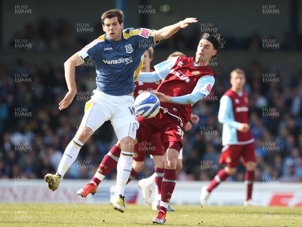 13.04.09.. Cardiff City v Burnley, Coca Cola Championship -  Cardiff's Joe Ledley and Burnley's Chris Eagles compete for the ball 