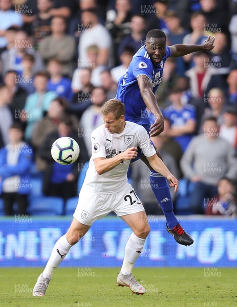 300918 - Cardiff City v Burnley, Premier League - Sol Bamba of Cardiff City gets above Matej Vydra of Burnley to head the ball