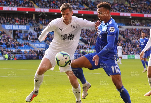 300918 - Cardiff City v Burnley, Premier League - Josh Murphy of Cardiff City and Kevin Long of Burnley compete for the ball