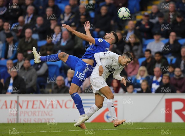 300918 - Cardiff City v Burnley, Premier League - Callum Paterson of Cardiff City and Matthew Lowton of Burnley compete for the ball