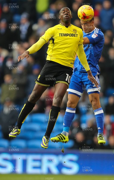 210117 - Cardiff City v Burton Albion, Sky Bet Championship - Lee Peltier of Cardiff City beats Lucas Akins of Burton Albion to the ball