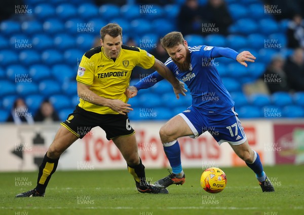 210117 - Cardiff City v Burton Albion, Sky Bet Championship - Aron Gunnarsson of Cardiff City and Ben Turner of Burton Albion compete for the ball