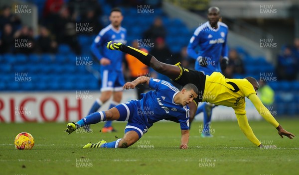 210117 - Cardiff City v Burton Albion, Sky Bet Championship - Lucas Akins of Burton Albion is brought down by Lee Peltier of Cardiff City