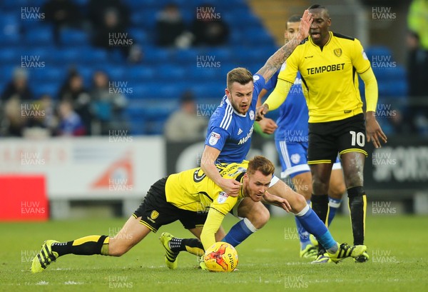 210117 - Cardiff City v Burton Albion, Sky Bet Championship - Joe Ralls of Cardiff City and Tom Naylor of Burton Albion compete for the ball