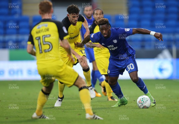 220817 - Cardiff City v Burton Albion, Carabao Cup Round 2 - Omar Bogle of Cardiff City holds off Tom Flanagan of Burton Albion