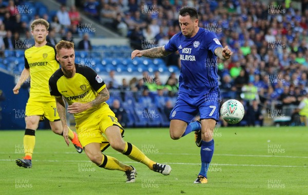 220817 - Cardiff City v Burton Albion, Carabao Cup Round 2 - Lee Tomlin of Cardiff City is challenged by Tom Naylor of Burton Albion