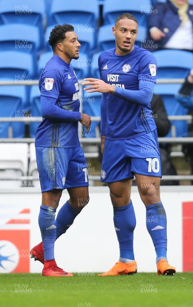 300318 - Cardiff City v Burton Albion, Sky Bet Championship - Nathaniel Mendez Laing of Cardiff City, left, celebrates with Kenneth Zohore of Cardiff City after scoring the second goal