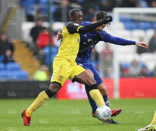 300318 - Cardiff City v Burton Albion, Sky Bet Championship - Marvin Sordell of Burton Albion and Sean Morrison of Cardiff City compete for the ball