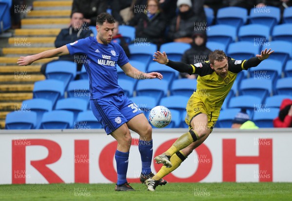 300318 - Cardiff City v Burton Albion, Sky Bet Championship - Yanic Wildschut of Cardiff City and Tom Naylor of Burton Albion compete for the ball