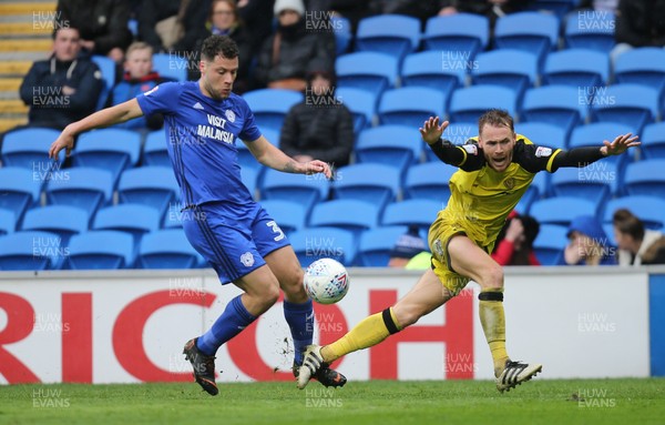 300318 - Cardiff City v Burton Albion, Sky Bet Championship - Yanic Wildschut of Cardiff City and Tom Naylor of Burton Albion compete for the ball