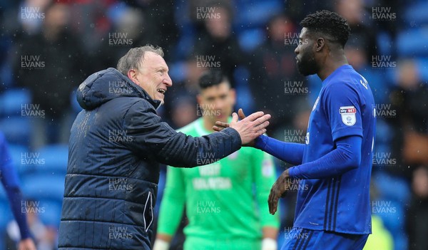 300318 - Cardiff City v Burton Albion, Sky Bet Championship - Cardiff City manager Neil Warnock congratulates Bruno Ecuele Manga of Cardiff City at the end of the match