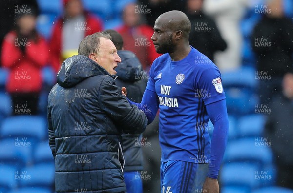 300318 - Cardiff City v Burton Albion, Sky Bet Championship - Cardiff City manager Neil Warnock congratulates Sol Bamba of Cardiff City at the end of the match