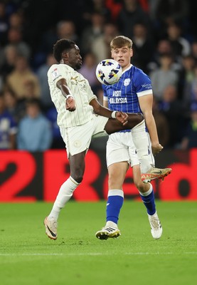 300925 - Cardiff City v Burton Albion, EFL Sky Bet League 1 - Fabio Tavares of Burton Albion and Dylan Lawlor of Cardiff City compete for the ball