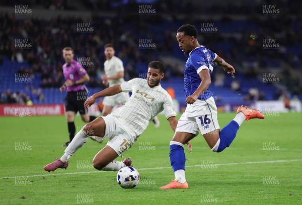 300925 - Cardiff City v Burton Albion, EFL Sky Bet League 1 - Chris Willock of Cardiff City is challenged by Kyran Lofthouse of Burton Albion