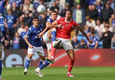 190926 Cardiff City v Charlton Athletic, EFL Sky Bet Championship - Krystian Bielik of Cardiff City and Miles Leaburn of Charlton Athletic compete for the ball
