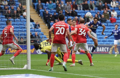 190926 Cardiff City v Charlton Athletic, EFL Sky Bet Championship - Joel Colwill of Cardiff City heads at goal