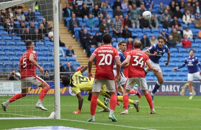 190926 Cardiff City v Charlton Athletic, EFL Sky Bet Championship - Joel Colwill of Cardiff City heads at goal