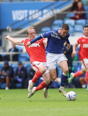 190926 Cardiff City v Charlton Athletic, EFL Sky Bet Championship - Jack Moylan of Cardiff City is brought down by Oliver Skipp of Charlton Athletic