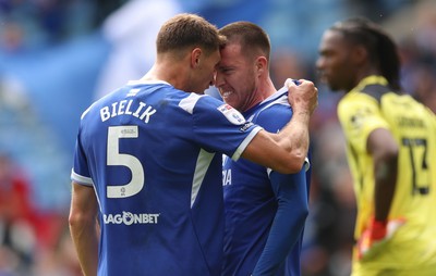 190926 Cardiff City v Charlton Athletic, EFL Sky Bet Championship - Jack Moylan of Cardiff City celebrates with Krystian Bielik of Cardiff City after scoring the third goal