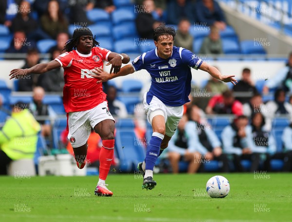 190926 Cardiff City v Charlton Athletic, EFL Sky Bet Championship - Perry Ng of Cardiff City holds off Tyreece Campbell of Charlton Athletic