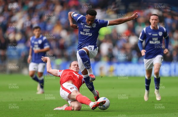 190926 Cardiff City v Charlton Athletic, EFL Sky Bet Championship - Chris Willock of Cardiff City is challenged by Oliver Skipp of Charlton Athletic