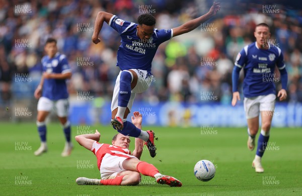 190926 Cardiff City v Charlton Athletic, EFL Sky Bet Championship - Chris Willock of Cardiff City is challenged by Oliver Skipp of Charlton Athletic