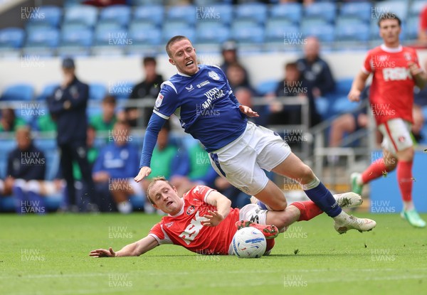 190926 Cardiff City v Charlton Athletic, EFL Sky Bet Championship - Jack Moylan of Cardiff City is brought down by Oliver Skipp of Charlton Athletic