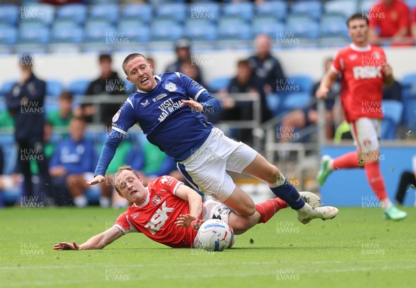190926 Cardiff City v Charlton Athletic, EFL Sky Bet Championship - Jack Moylan of Cardiff City is brought down by Oliver Skipp of Charlton Athletic