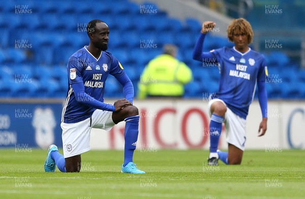 300620 - Cardiff City v Charlton Athletic - SkyBet Championship - Albert Adomah of Cardiff City takes the knee at the start of the game in support of Black Lives Matter