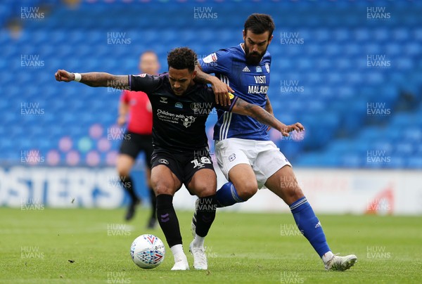 300620 - Cardiff City v Charlton Athletic - SkyBet Championship - Andre Green of Charlton Athletic is challenged by Marlon Pack of Cardiff City