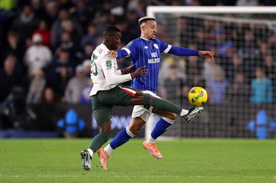 161225 - Cardiff City v Chelsea - EFL Cup Quarter Final - Callum Robinson of Cardiff is tackled by Moises Caicedo of Chelsea 