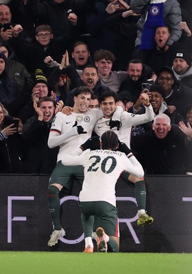 161225 - Cardiff City v Chelsea - EFL Cup Quarter Final - Alejandro Garnacho of Chelsea celebrates scoring a goal with Facundo Buonanotte and Joao Pedro