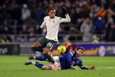 161225 - Cardiff City v Chelsea - EFL Cup Quarter Final - Joao Pedro of Chelsea is tackled by Calum Chambers of Cardiff 