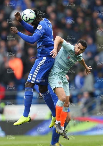 310319 - Cardiff City v Chelsea, Premier League - Bruno Ecuele Manga of Cardiff City and Pedro of Chelsea compete for the ball