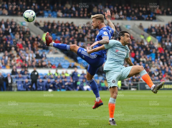 310319 - Cardiff City v Chelsea, Premier League - Joe Bennett of Cardiff City and Pedro of Chelsea compete for the ball