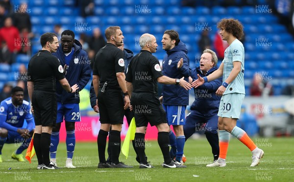 310319 - Cardiff City v Chelsea, Premier League - Cardiff City manager Neil Warnock gets Harry Arter of Cardiff City away from the match officials at the end of the match