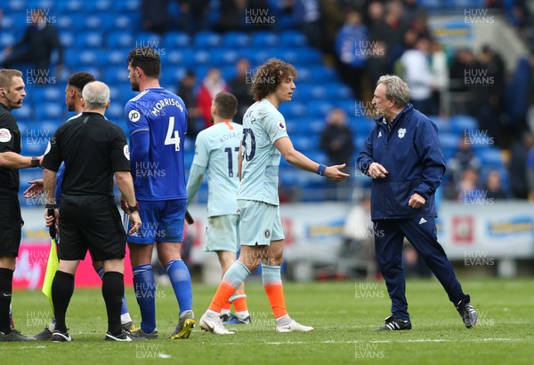 310319 - Cardiff City v Chelsea, Premier League - Cardiff City manager Neil Warnock with David Luiz of Chelsea
