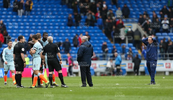 310319 - Cardiff City v Chelsea, Premier League - Cardiff City manager Neil Warnock stands off with the match officials at the end of the match